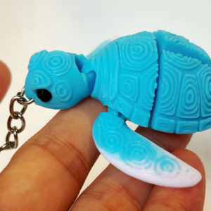 Llavero tortuga articulada con relieve